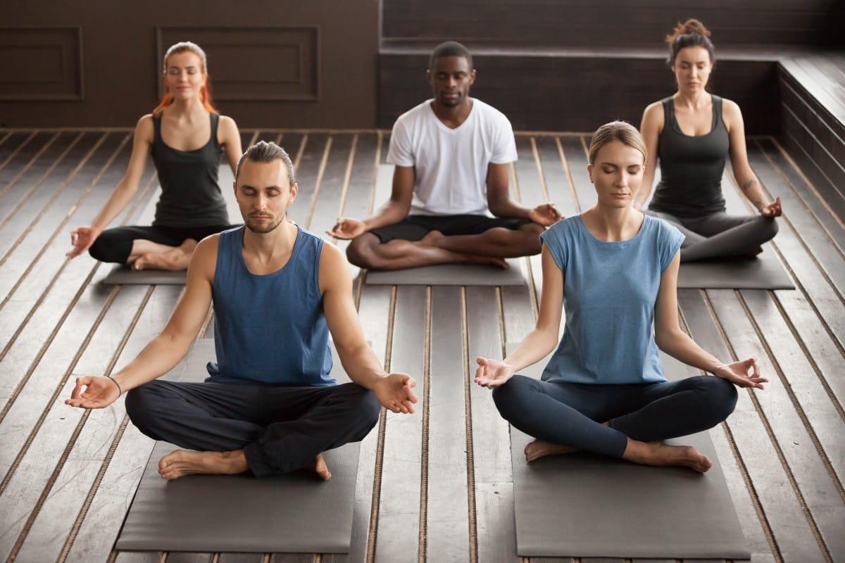group-young-yogi-people-sitting-sukhasana-exercise (1)